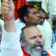 Activists of the Rashtrawadi Sena shout slogans against the UPA government during a demonstration against Naxalites at Jantar Mantar in New Delhi on Wednesday.