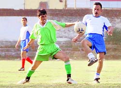 A match of the Institutional Football League in progress in Dehradun on Wednesday.