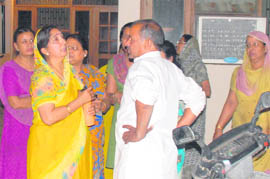 Relatives of Lalit Gupta who got bullet injuries outside his residence in NAC, Mani Majra, on Thursday night.