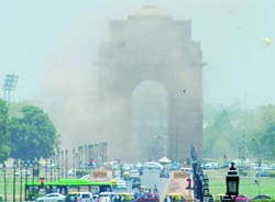 A dust storm builds up at India Gate in New Delhi