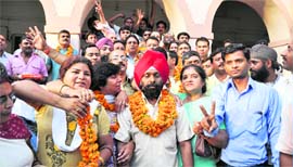 BJP councillors in a jubilant mood after winning all 12 seats of the DPC.
