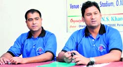 Dharmender Kharola (right) addresses mediapersons in Dehradun on Thursday.