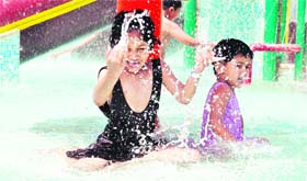 Children enjoy themselves in a pool at Joyland Sahastradhara in Dehradun.