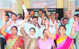 Winners at the DPC poll in Haridwar show the victory sign on Thursday.