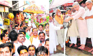 Devotees take out a religious procession on Ganga Saptami; and members of the Ganga Sabha offer milk to the Ganga at Har-ki-Pauri in Haridwar on Thursday.