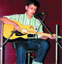 A child performs during a talent hunt programme in Amritsar. 