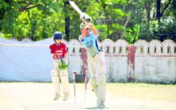 A batsman gets bowled at the All-India DSL Alovera T-20 Cricket Tournament in Dehradun on Friday.