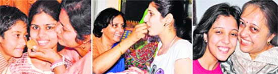 Pragya Kaushik of Shiv Dale School with her family, (centre) Shilpi Chauhan of DAV School and (right) Shaivya Rastogi of Delhi Public School with her mother in celebration mood after CBSE results of Class XII were declared in the state.