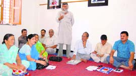 Statehood agitators hold a meeting in Dehradun on Friday.