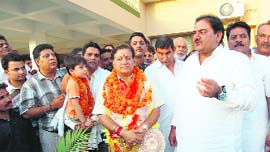 Krishan Gumbar, newly elected municipal councillor, with Abhey Singh Chautala in Sirsa on Friday.