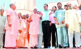BJP leader Sanjay Tandon (second from left), along with others, at Chaitanya Gaudiya Math Mandir in Sector 20, Chandigarh