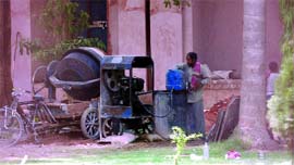 The mortar mixer is utilised for the wall plaster outside Safdarjung Tomb.