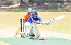A batsman plays a shot at the All-India DSL Alovera T20 Cricket Tournament in Dehradun on Saturday. 