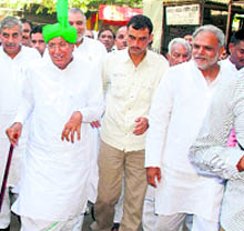 Former Chief Minister Om Prakash Chautala arrives to appear in a court in Gurgaon on Saturday