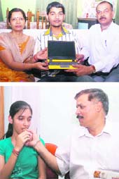 Vibhor Sharma, who stood second in the Class X exams, receives a laptop from his parents at his home in Jeevan Nagar in Jammu on Saturday; and (below) Kiran Anand, who secured the third position, being felicitated by her father. 