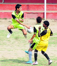 Players in action at the Narendra Singh Kharola Memorial Football 