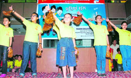 Kids perform during a function at the City Squire Mall in Jammu on Sunday