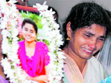 A woman mourns death of her relative in Mangalore