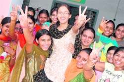 Students of Jain Girls Senior Secondary School, Ambala Cantt, after the declaration of class XII results on Monday. 