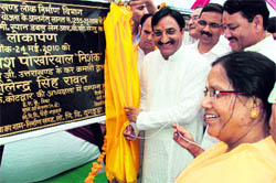 Uttarakhand Chief Minister Ramesh Pokhriyal Nishank inaugurates a birdge at Kotdwar town in Pauri Garhwal region on Monday