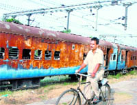Train coaches damaged in violence about a year ago still lie at Jalandhar Cantt railway station