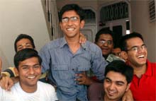 Tarun Mangla sharing happy moments with his friends after obtaining the 79th rank in the IIT-JEE examination at his residence in Bathinda on Wednesday