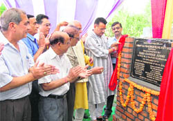 Ganesh Joshi, MLA from Rajpur, lays the foundation stone of the Punjabi Biradari Welfare Society in Dehradun on Wednesday.