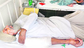 Puran Singh, a witness, who was attacked by the rival party on the court premises on Thursday, at the Civil Hospital in Karnal.