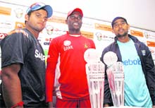 Indias Suresh Raina (L), Zimbabwes Elton Chigumbura (C) and Sri Lankas T Dilshan pose at a press meet in Bulawayo on Thursday.
