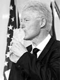 Former President Bill Clinton kisses the Sons of Italy Foundation 2010 Lifetime Achievement Award for Public Service in Washington on Wednesday.