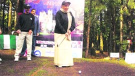 Uttarakhand Governor Margaret Alva gets ready to tee off at the launch of the Governors' Cup Golf Tournament in Nainital on Friday.