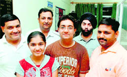 Utkarsh Anand, another topper from DPS, with his family members and friends