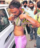 A rickshaw pullar who was thrashed near AC market in Ludhiana. 