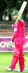 Brendan Taylor celebrates his half century on Friday. 