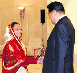 President Pratibha Patil with Jia Qinglin, chairman, Chinese People's Political Consultative Conference, in Beijing.