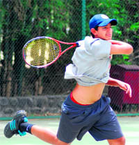 A player in action during the AITA Talent Series Tennis Tournament at the CLTA, Sector 10, Chandigarh, on Saturday