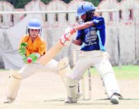 A batsman plays a shot at the All-India DSL Aloevera under-16 Cricket Tournament in Dehradun on Saturday