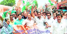 Members of the Congress hold a protest in Haridwar on Sunday.