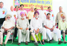 The beneficiaries who got prosthetics, calipers and other devices during a camp organised by the Maharaja Aggarsain Sewa Sangh in Ludhiana on Sunday.