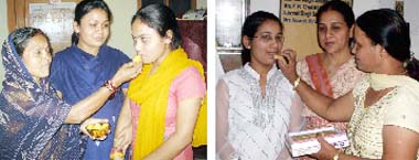 Mohini (left) and Neha celebrating their success