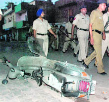 The damaged scooter after the clash at Mauli Jagran in Chandigarh on Monday. 