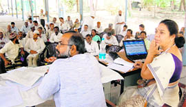 Ashish Kothari and Roma, both members of a committee, hold a public hearing to know woes of forest dwellers in Dehradun on Sunday.