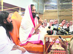 Art of Living founder Sri Sri Ravi Shankar addresses a press conference in Bangalore on Monday.