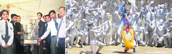 AGM, Northern Railway, Keshav Chandra presents the Cock House Trophy to winners of Oak Grove School in Mussoorie on Tuesday and (right) Krishna, a fusion dance, being presented by students.