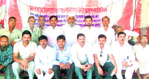 Members of the BHEL Bhoomi Visthapit Kisan and Berozgar Samiti hold a protest with various farmer unions supporting them in Haridwar on Tuesday. 