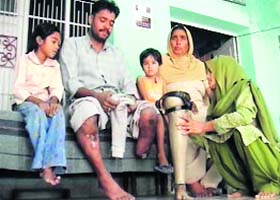 Rakesh Kumar along with his family