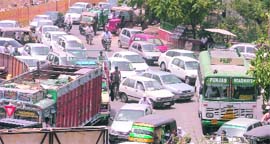 Heavy traffic at Pratap Chowk, the construction of which was started on May 25, in Ludhiana.