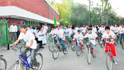 Youngsters at the cycle rally organised as part of the Go Green campaign 