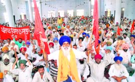 Members of the Punjab Kisan Sabha hold a meeting in Jalandhar on Tuesday in connection with Sirhind Fateh Diwas.