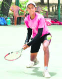 A tennis player in action during the semifinal of AITA Talent Series Tennis Tournament at the Chandigarh Lawn Tennis Association courts, Sector 10, Chandigarh,on Wednesday. 